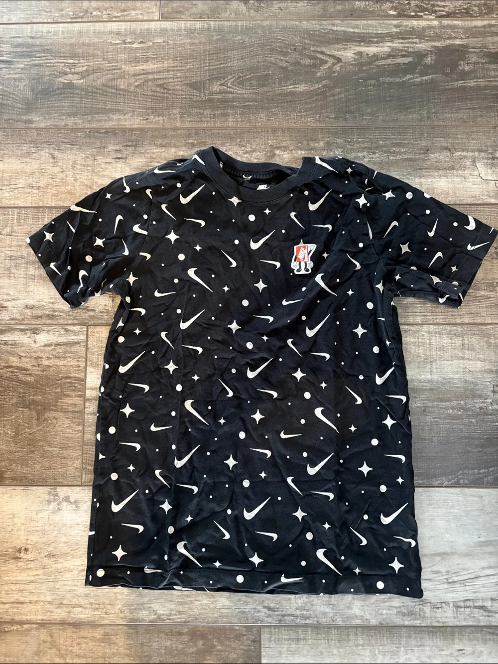 Nike Black Tee with White Swoosh & Star Print